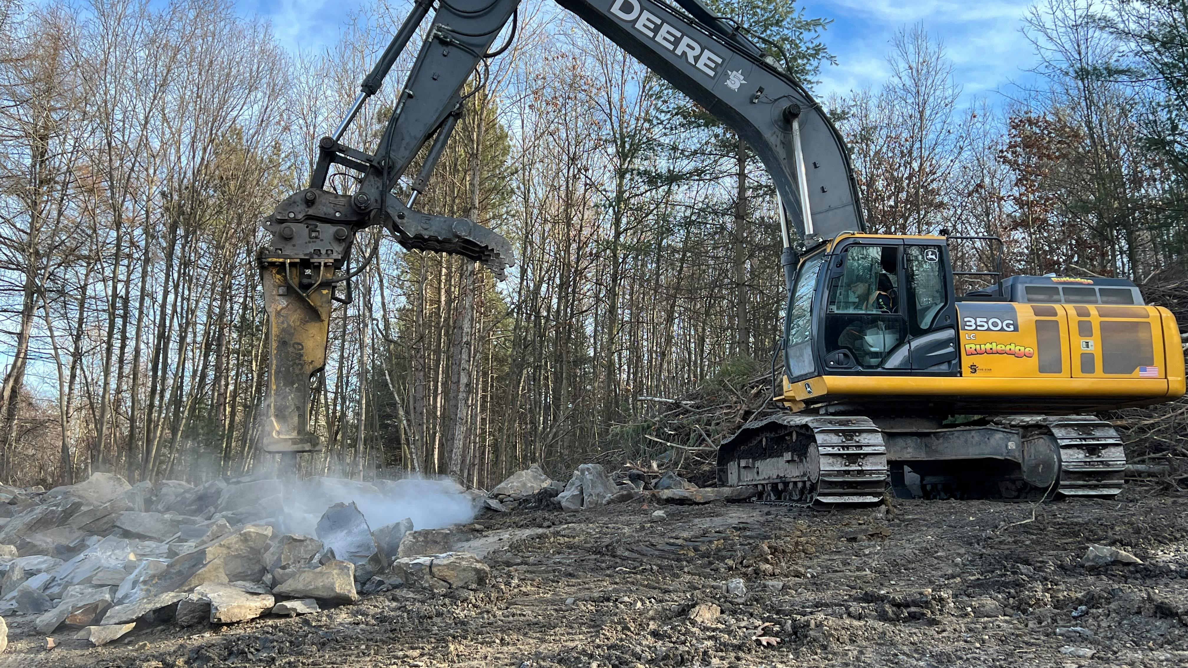 Excavator with hammer