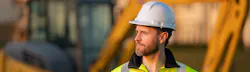 Teletrac Navman construction worker with hardhat, looking cool Teletrac Navman construction worker with hardhat, looking cool