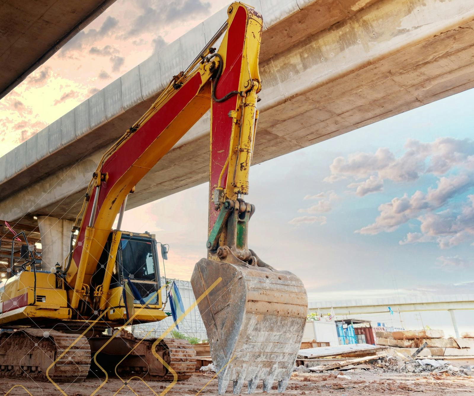 Teletrac Navman data flows into an excavator under a bridge