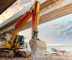Teletrac Navman data flows into an excavator under a bridge Teletrac Navman data flows into an excavator under a bridge