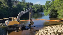 Excavator in water Excavator in water