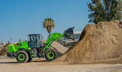 LiuGong 856HE Electric wheel loader digging in a dirt pile. LiuGong 856HE Electric wheel loader digging in a dirt pile.
