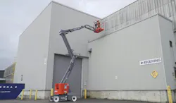 Skyjack SJ45 AJN and SJ45 ARJN Slab Booms, lifting a man to the roof. Skyjack SJ45 AJN and SJ45 ARJN Slab Booms, lifting a man to the roof.