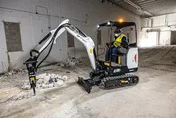 Bobcat E19e compact excavator electric using a breaker indoors. Bobcat E19e compact excavator electric using a breaker indoors.