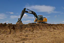 The 250G excavating machine moving earth is a product of John Deere Co The 250G excavating machine moving earth is a product of John Deere Co