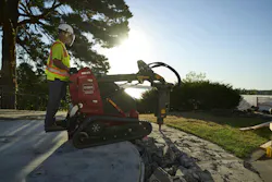 Toro eDingo TX 750 with a breaker attachment. Toro eDingo TX 750 with a breaker attachment.