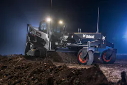 Bobcat T86-2 compact track loader with a grader blade and lights ablazin'. Bobcat T86-2 compact track loader with a grader blade and lights ablazin'.