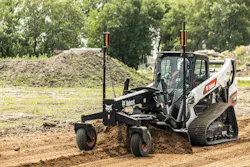Bobcat t86 compact track loader using a grader blade. Bobcat t86 compact track loader using a grader blade.