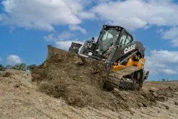 Case Minotaur DL 550 dozer compact track loader pushing dirt. Case Minotaur DL 550 dozer compact track loader pushing dirt.