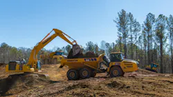 Komatsu truck being loaded Komatsu truck being loaded