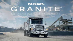 Mack Granite truck rolling through an aggregates plant. Mack Granite truck rolling through an aggregates plant.