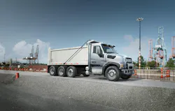 Mack Granite dump truck riding through an asphalt plant. Mack Granite dump truck riding through an asphalt plant.