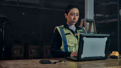 Dewalt Ecomm Tool Connect. Woman on laptop. Dewalt Ecomm Tool Connect. Woman on laptop.