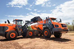 Develon DL320-7 loading an ADT. Develon DL320-7 loading an ADT.
