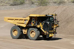 Caterpillar autonomous mining truck rolling. Caterpillar autonomous mining truck rolling.