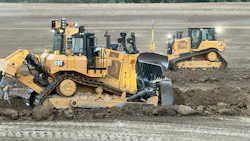 Caterpillar dozers moving dirt Caterpillar dozers moving dirt