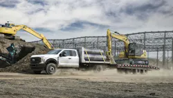 Ford pickup hauling excavator Ford pickup hauling excavator