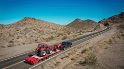 Ram pickup hauling tractor Ram pickup hauling tractor