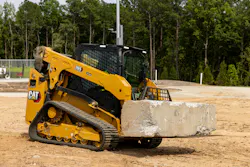 Cat CTL carrying concrete block Cat CTL carrying concrete block