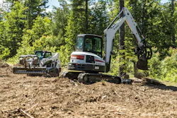 Bobcat compact track loader and mini excavator working on a forest project. Bobcat compact track loader and mini excavator working on a forest project.