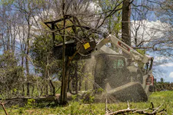 Bobcat T86 drum mulcher on a compact track loader. Bobcat T86 drum mulcher on a compact track loader.