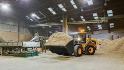 A JCB wheel loader indoors A JCB wheel loader indoors