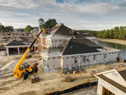JCB 509 telehandler lifting materials to the top of a sweet-ass house, yo. JCB 509 telehandler lifting materials to the top of a sweet-ass house, yo.