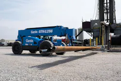 Genie GTH-1256 telehandler holding some pipe. Genie GTH-1256 telehandler holding some pipe.