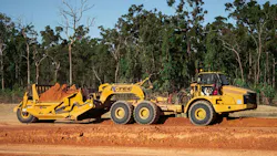 Cat ADT pulling scraper Cat ADT pulling scraper
