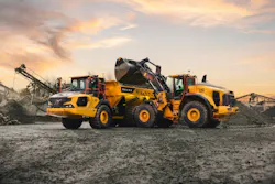 Volvo Construction Equipment wheel loader dumping into an ADT. Volvo Construction Equipment wheel loader dumping into an ADT.
