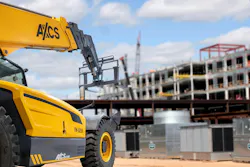 AXCS Equipment TH 1256 telehandler on a jobsite. AXCS Equipment TH 1256 telehandler on a jobsite.