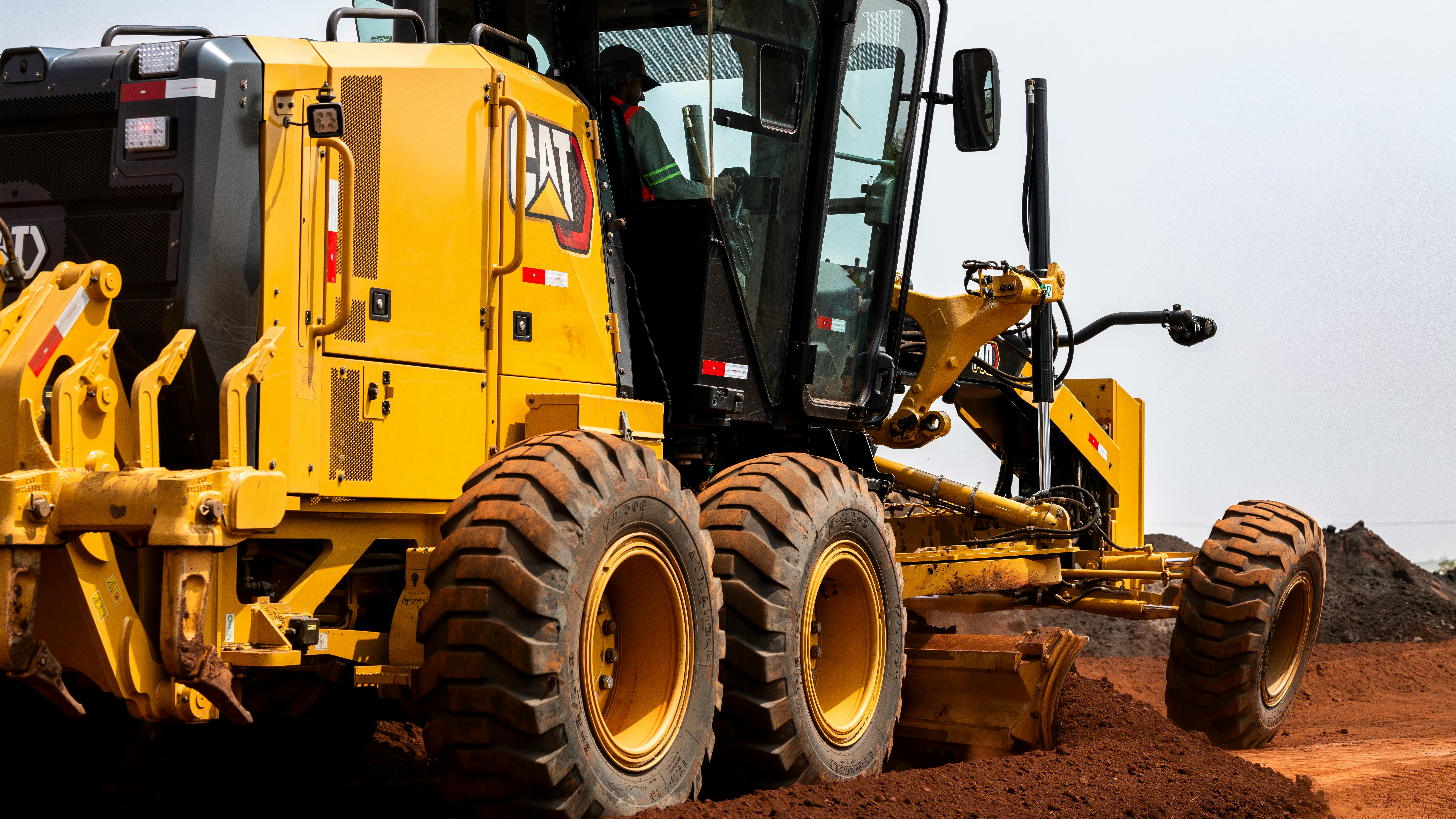 Cat grader moving dirt