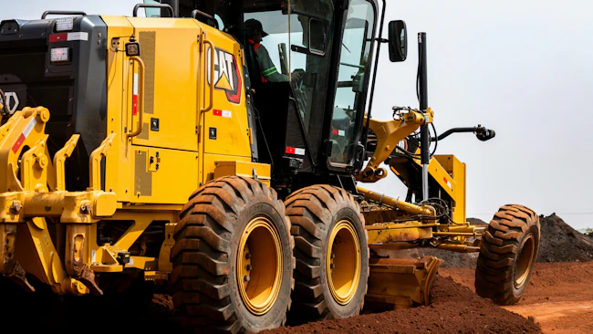 Cat grader moving dirt