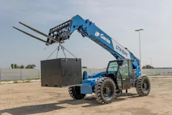 Genie GTH-1544 telehandler using rigging chains to carry a block. Genie GTH-1544 telehandler using rigging chains to carry a block.