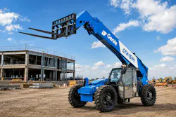 Genie GTH-1544 telehandler sitting on a jobsite. Genie GTH-1544 telehandler sitting on a jobsite.