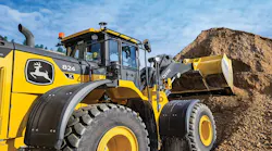 John Deere wheel loader moving dirt John Deere wheel loader moving dirt