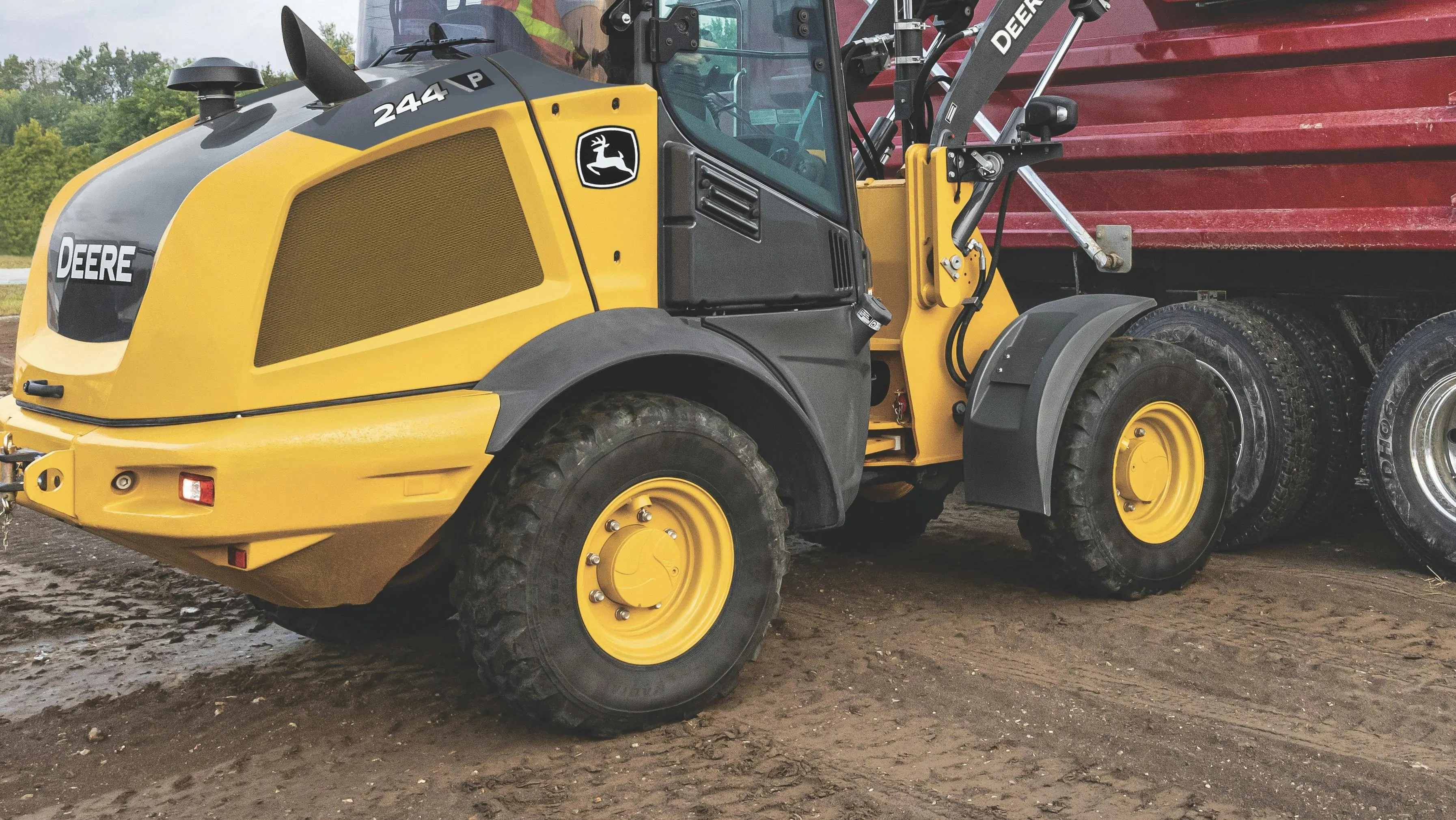 John Deere 244 P-Tier compact wheel loader, Focus on tires.
