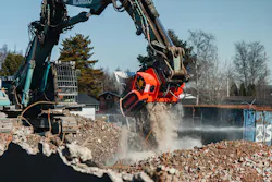 Allu concrete crushing buckets, processing debris with an excavator.
