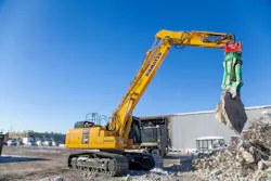 Lehnhoff SQ-V quick coupler system on a Komatsu excavator.