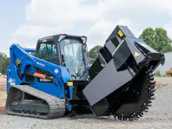 Blue Diamond Road Saw attachment on a blue compact track loader.