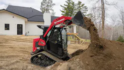 Yanmar TL50RP CTL dumps dirt