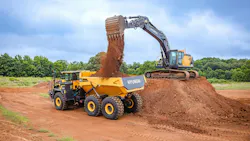 Hyundai excavator loading dump truck
