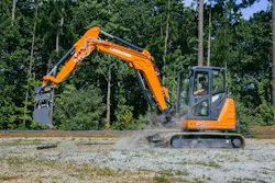 Landcros ZX60USB-7 mini excavator working with a bucket.