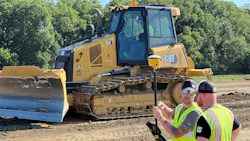 Cat dozer, survey crew