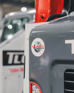 Takeuchi Fleet Management telematics sticker on a compact track loader.