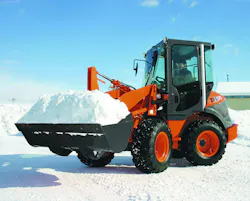 Hitachi ZW50-5B compact wheel loader holding a bucket of snow.