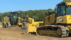 Cat grader and dozer