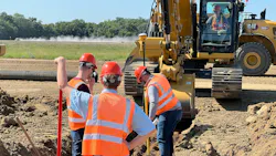 Workers checking grade