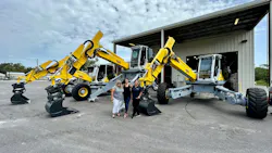 Three people with excavators