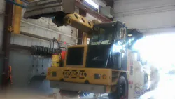 Excavator in shop